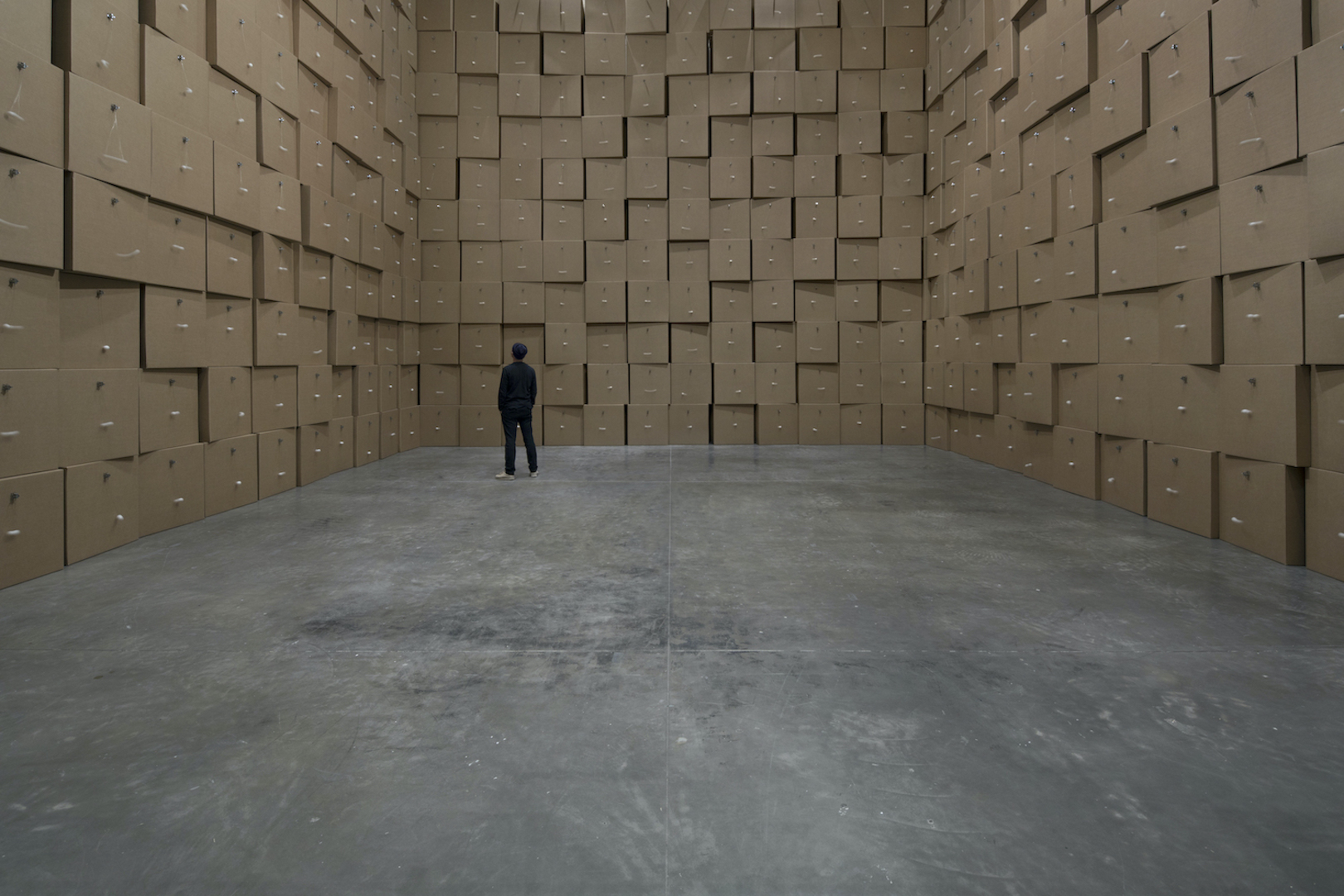 168 prepared dc-motors, cotton balls, cardboard boxes by Zimoun